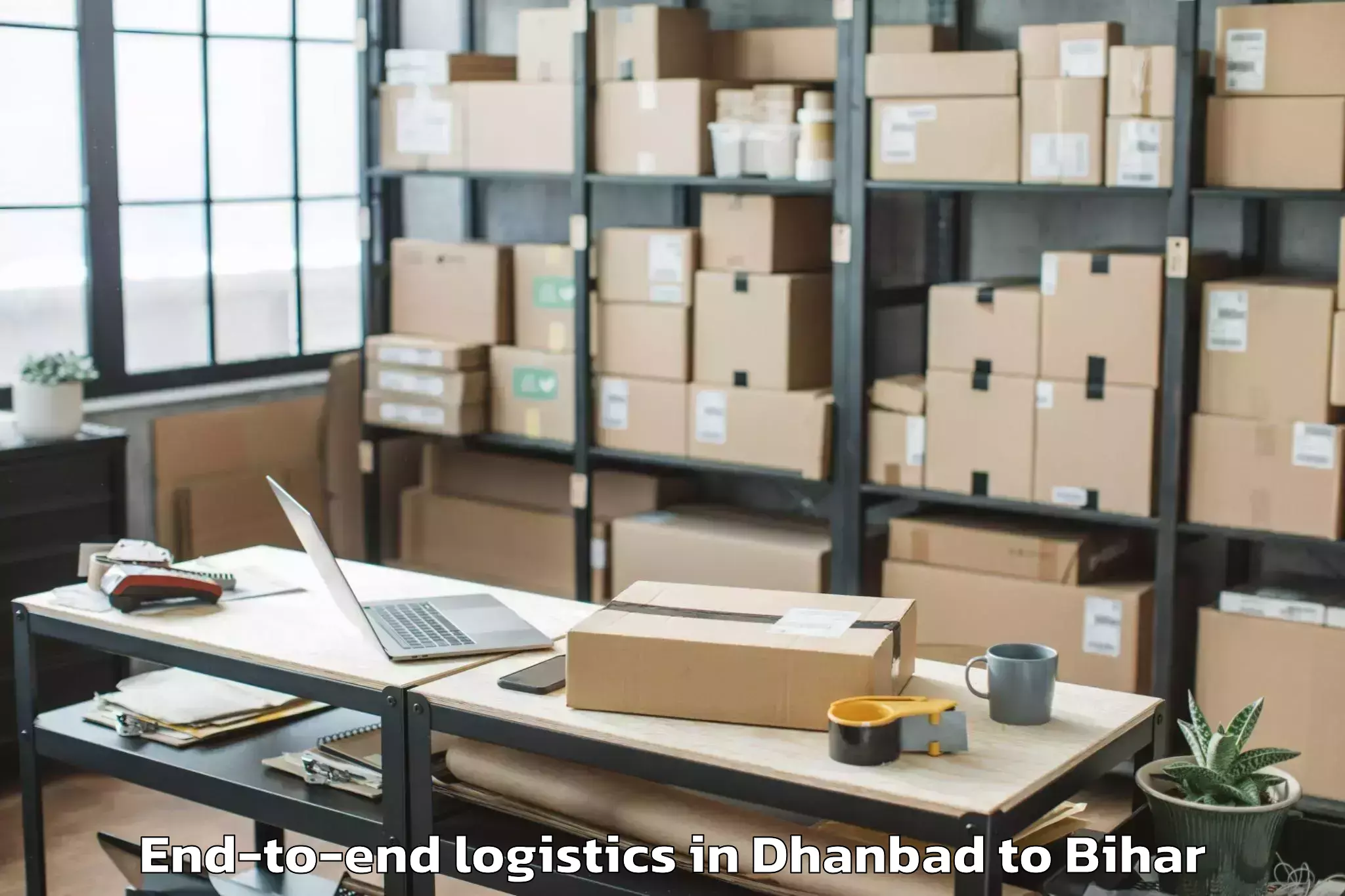 Trusted Dhanbad to Barauli End To End Logistics